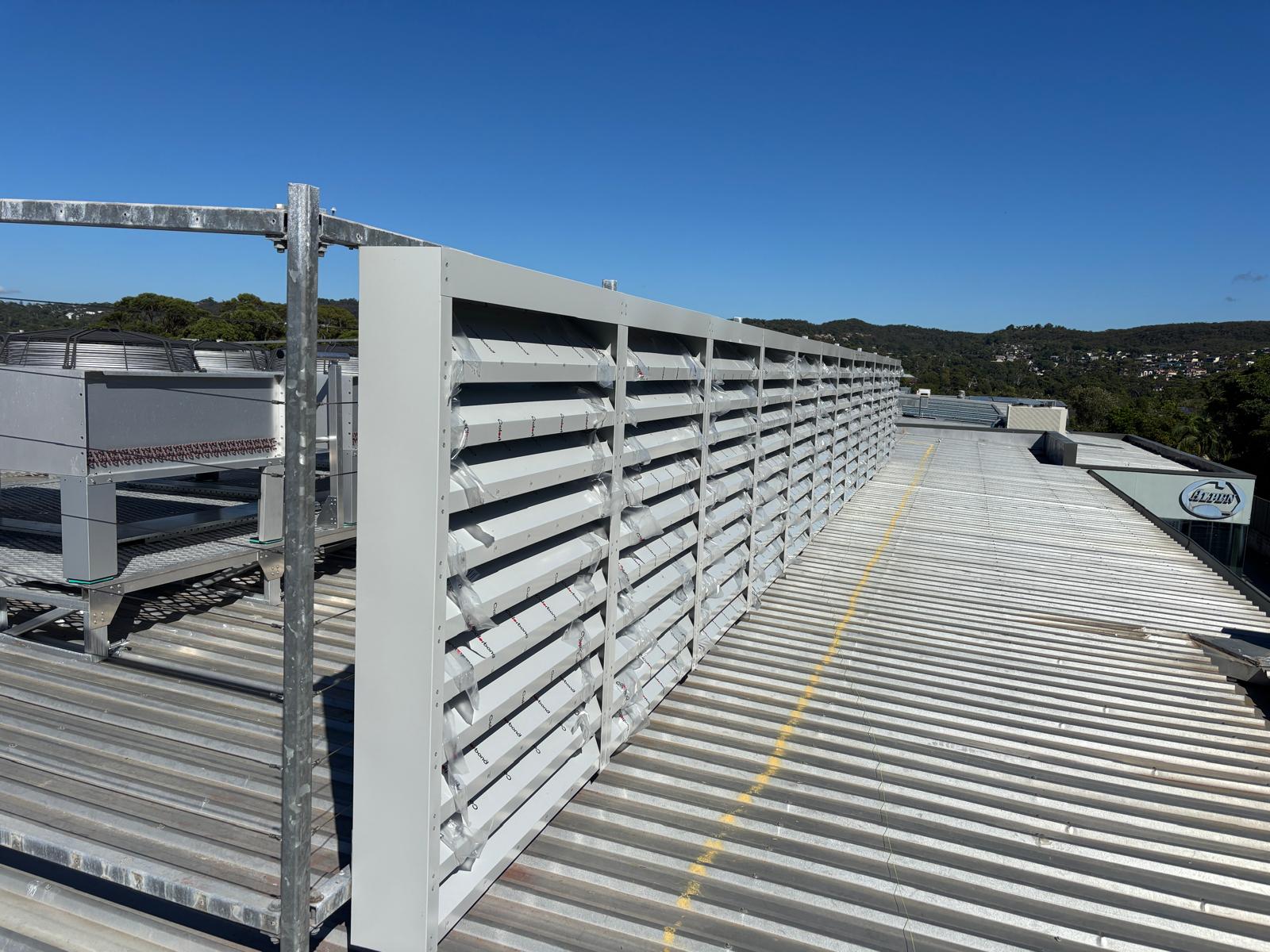200mm acoustic louvres in Colorbond installed on a roof plantroom in Cromer for Voyager Air