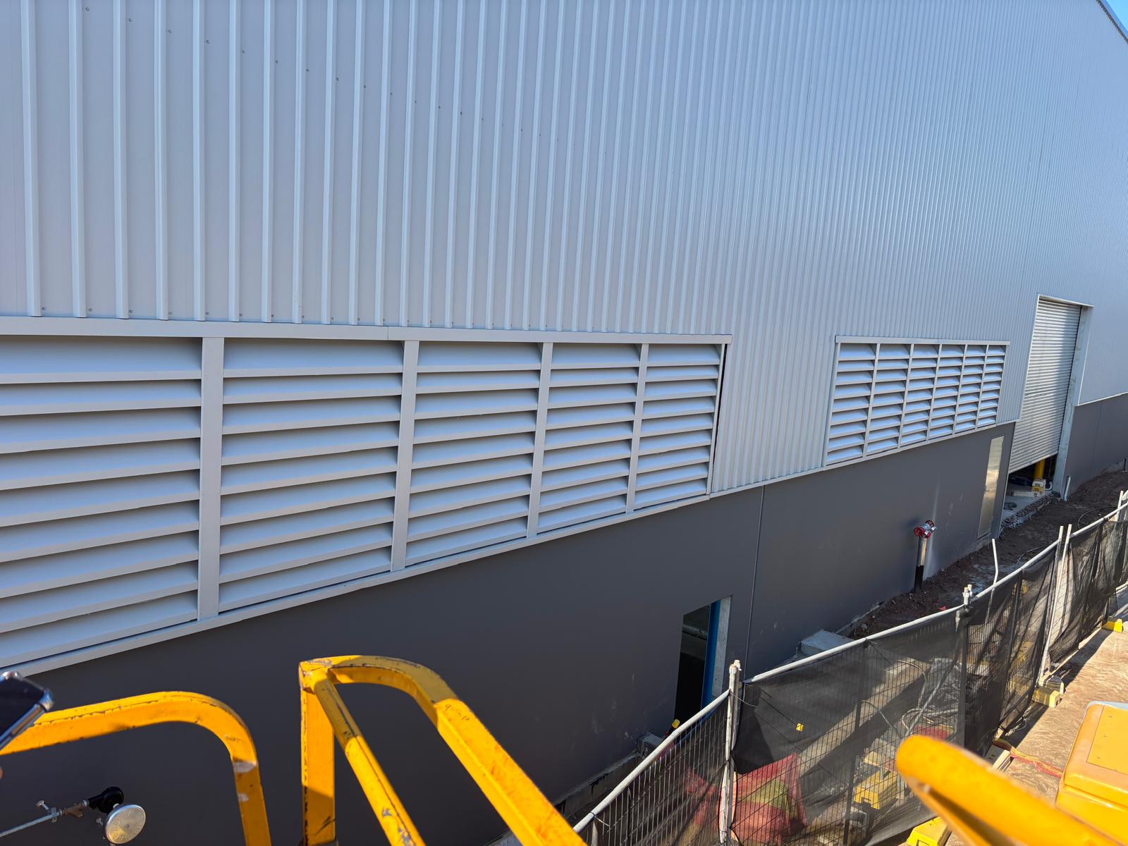 400mm chevron acoustic louvres installed at Daikin Airconditioning Head Office for CIP Construction